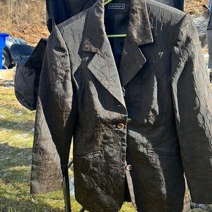 Vintage womens shiny size M one of a kind blazer. Bought in Amsterdam.